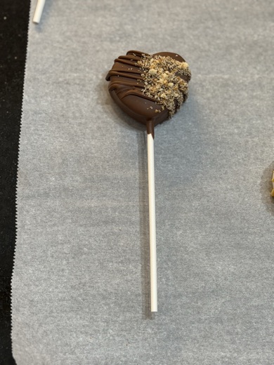 Chocolate cake pop with gold
