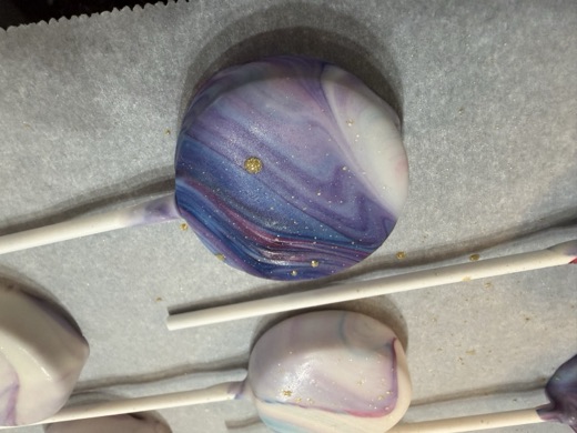 Galaxy marble cake pop with gold splatter